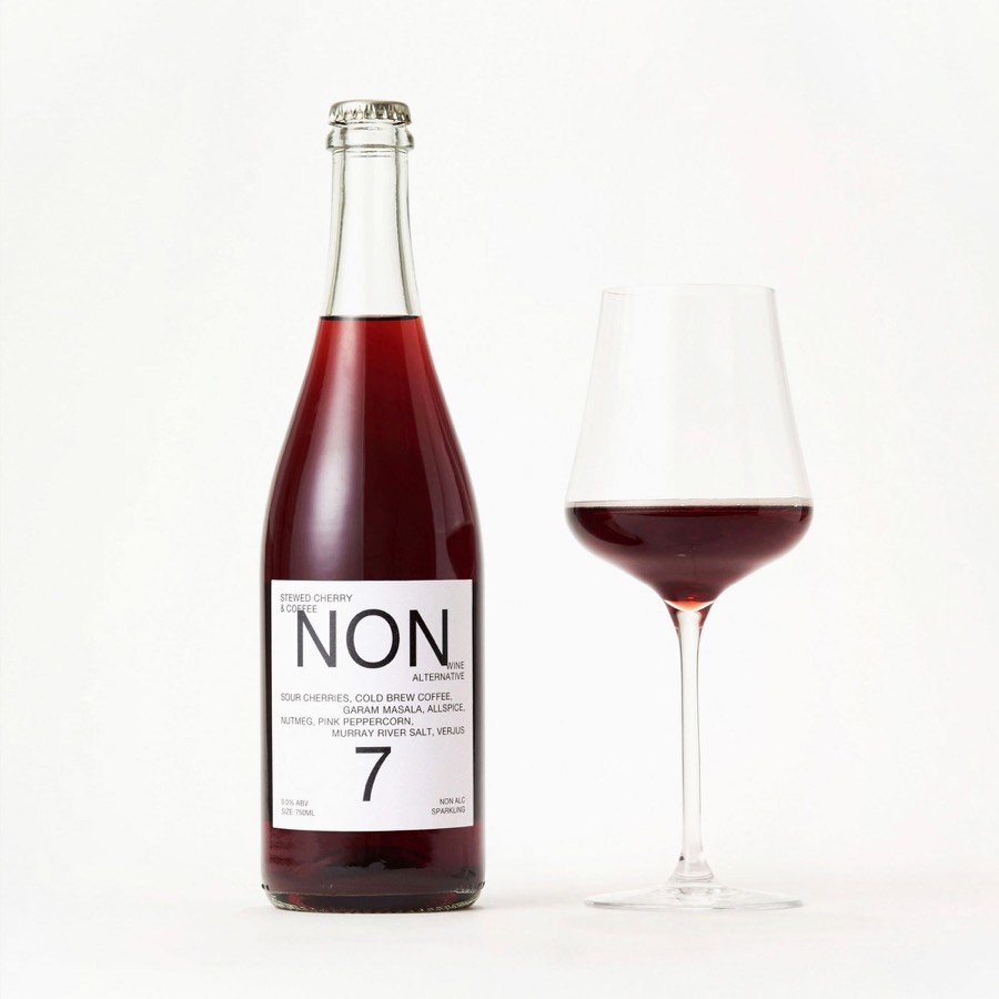 NON 7 bottle beside a poured glass